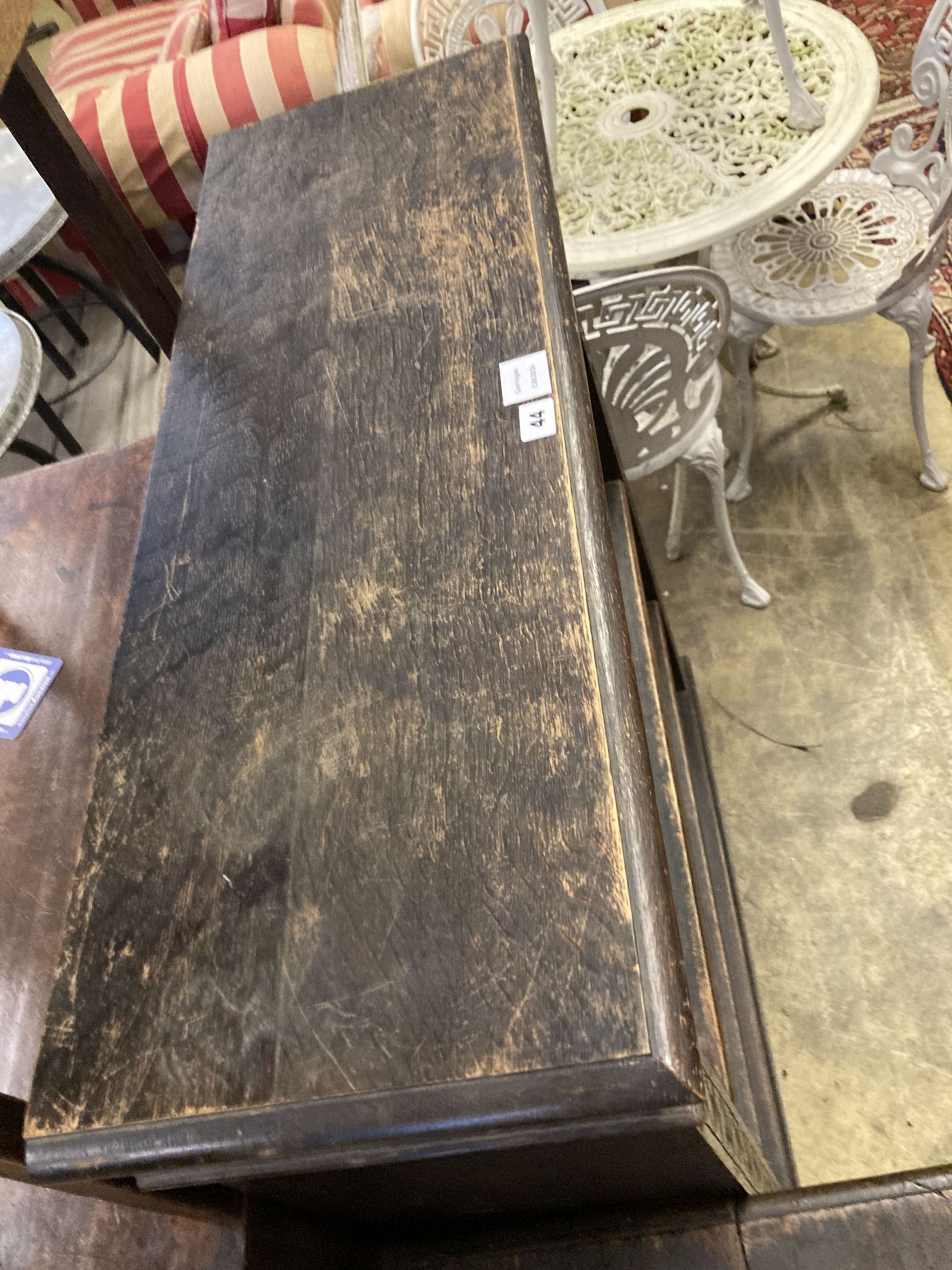 A late Victorian carved oak open bookcase, length 92cm, depth 31cm, height 115cm